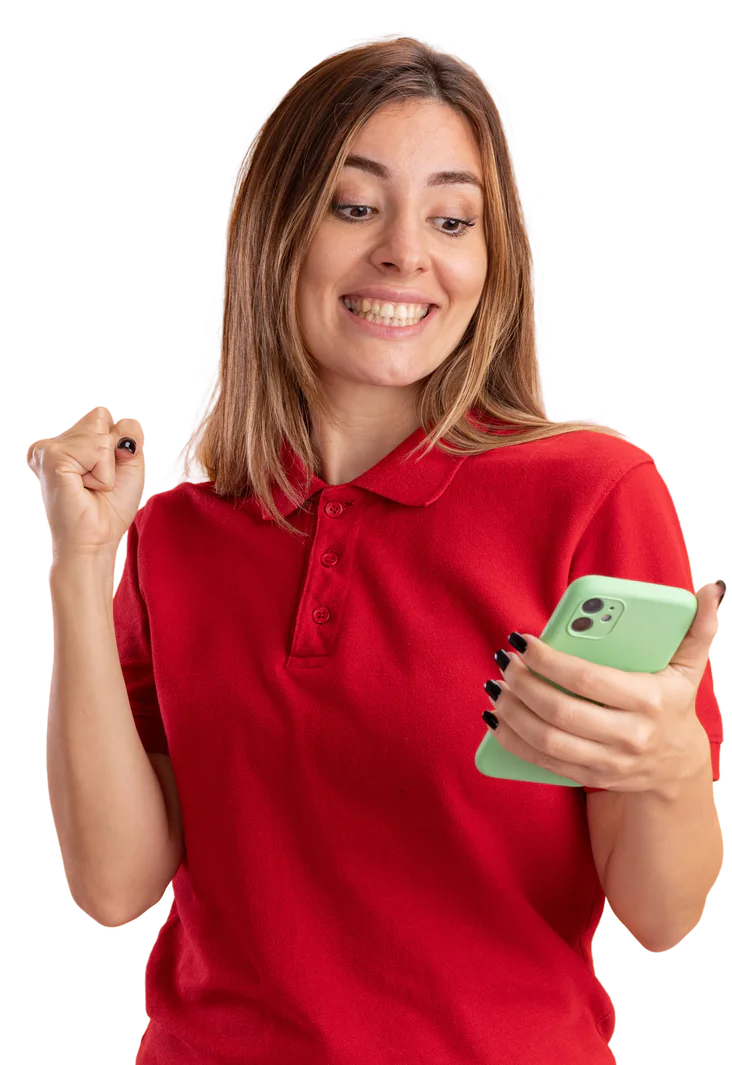 Excited young woman in a red polo holding a phone
