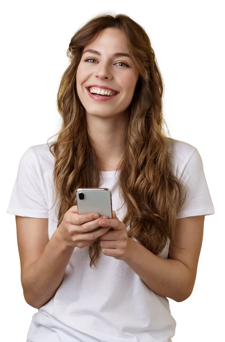 Smiling young woman in a white T-shirt holding a phone